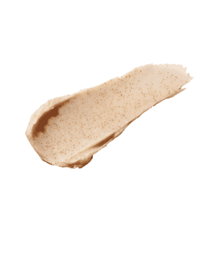Smear of the Pro Kiss'r Lip-Loving Scrubstick on a white background, showcasing its thick consistency and fine sandy texture.