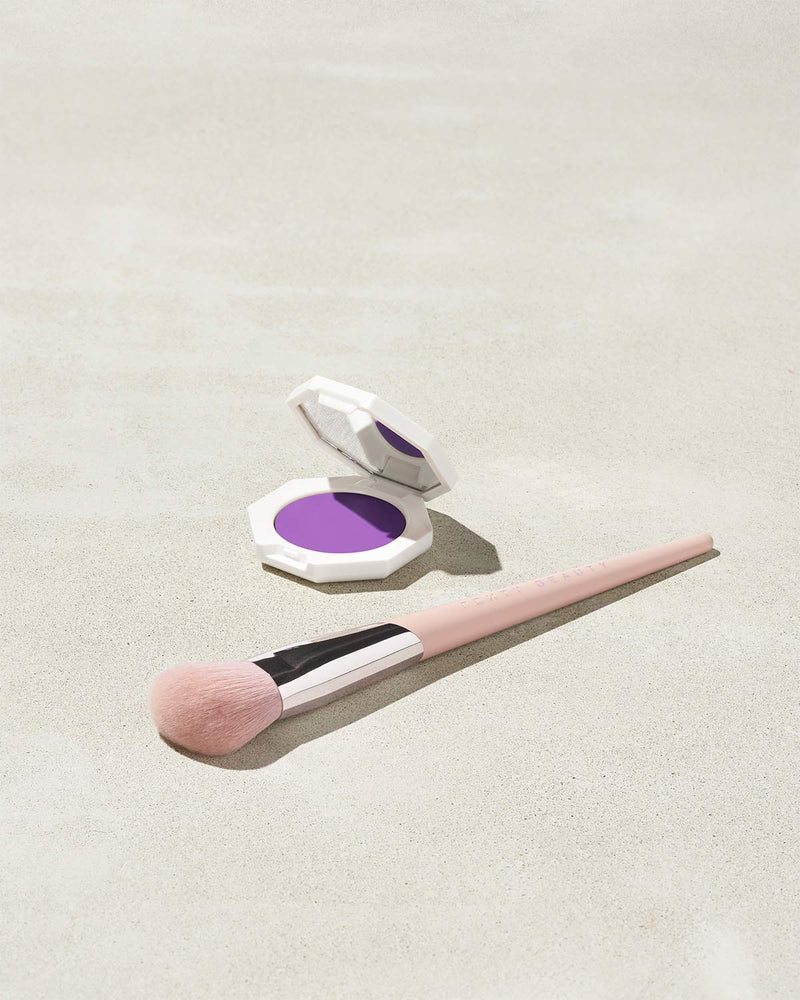 Cheeks Out Freestyle Cream Blush shown in shade Drama Cla$$ with Face Shaping Brush 125
